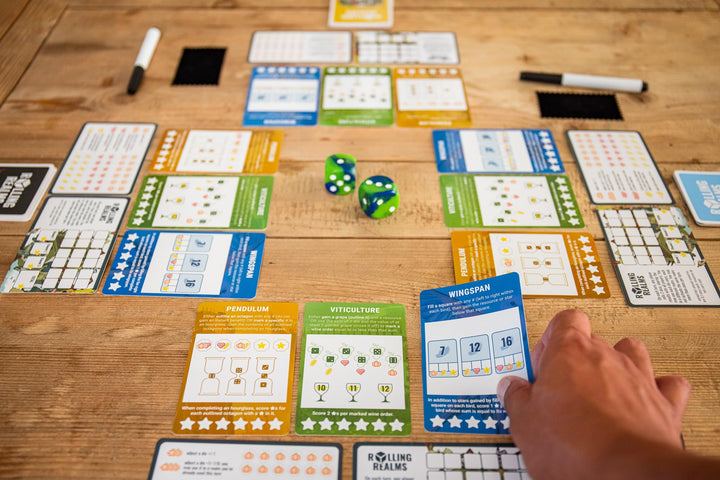Rolling Realms A Light Strategic Roll-and-Write Board Game for Families and Adults