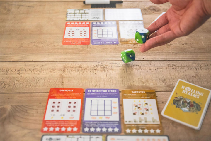 Rolling Realms A Light Strategic Roll-and-Write Board Game for Families and Adults