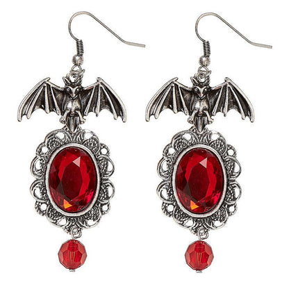 Pair Of Bat Earrings With Red Gems